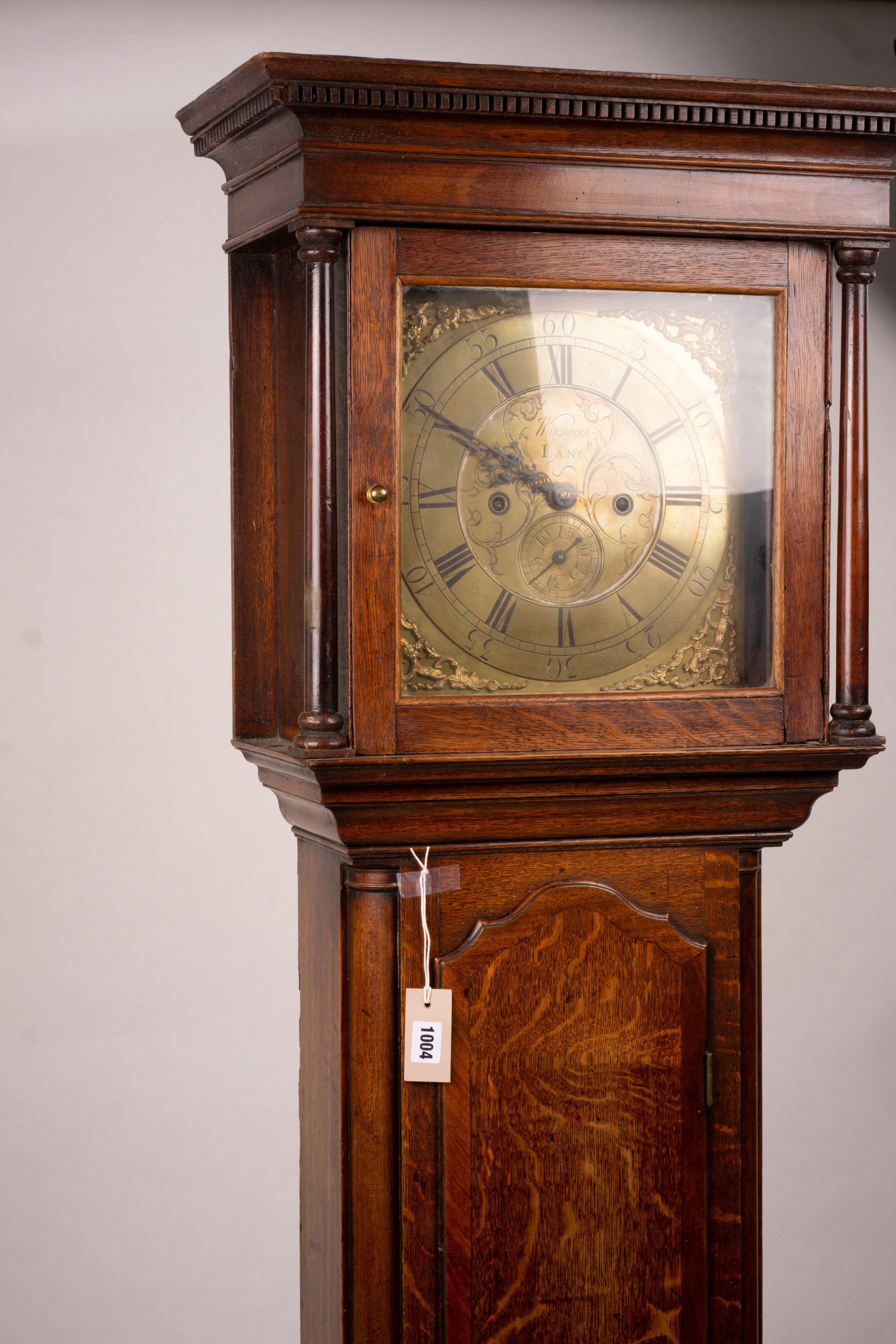 A George III oak 8 day longcase clock, marked Thomas Worswick of Lancaster, height 210cm